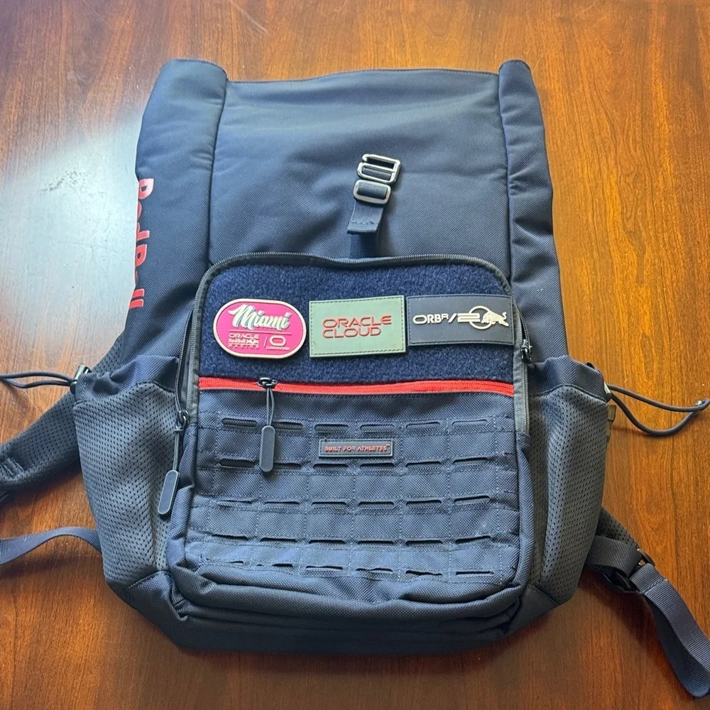 Oracle Red Bull Racing Formula F1 Roll Top Backpack with 3 Removable Patches